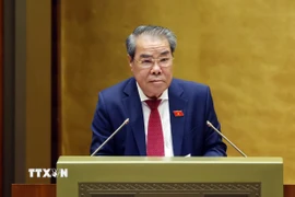 Chủ nhiệm Ủy ban Dân nguyện và Giám sát của Quốc hội Dương Thanh Bình trình bày Báo cáo kết quả giám sát việc giải quyết kiến nghị của cử tri gửi đến Kỳ họp thứ 9, Quốc hội khóa XV. (Ảnh: Phạm Kiên/TTXVN)