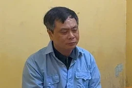 Bị can Phạm Văn Long, Hiệu trưởng trường Cao đẳng Du lịch Hà Nội. (Ảnh: Công an cung cấp)