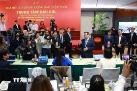 Thủ tướng Phạm Minh Chính thăm Trung tâm báo chí Đại hội Đảng toàn quốc lần thứ XIV. (Ảnh: TTXVN)