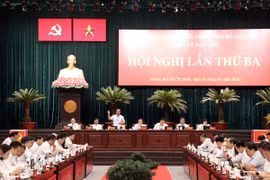 Các đại biểu chủ trì Hội nghị. (Ảnh: Tiến Lực/TTXVN)