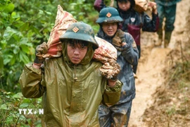 Cán bộ, chiến sỹ luôn quyết tâm, tin tưởng hoàn thành thắng lợi “Chiến dịch Quang Trung.” (Ảnh: Quốc Dũng/TTXVN)
