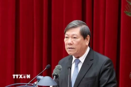 Ông Trần Văn Rón, Ủy viên Trung ương Đảng, Phó Chủ nhiệm Thường trực Ủy ban Kiểm tra Trung ương, trình bày báo cáo tại hội nghị. (Ảnh: Phương Hoa/TTXVN)