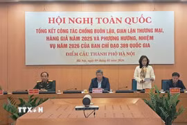 Bà Nguyễn Kiều Oanh, Phó Giám đốc Sở Công Thương Hà Nội, trình bày tại Hội nghị. (Ảnh: Phương Anh/TTXVN)