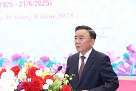 Ông Trần Cẩm Tú, Ủy viên Bộ Chính trị, Thường trực Ban Bí thư, phát biểu khai mạc hội thảo. (Ảnh: Phương Hoa/TTXVN)