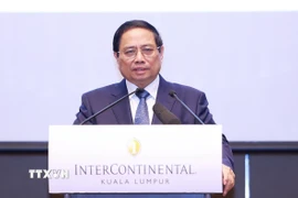 Thủ tướng Phạm Minh Chính phát biểu tại chương trình gặp gỡ doanh nghiệp Việt Nam-Malaysia. (Ảnh: Dương Giang/TTXVN)