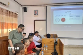 Các thí sinh thực hiện phần thi. (Ảnh: TTXVN phát)