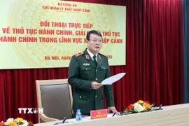 Thiếu tướng Nguyễn Bá Tuấn, Phó Cục trưởng Cục Quản lý xuất nhập cảnh, Bộ Công an, phát biểu. (Ảnh: Phạm Kiên/TTXVN)