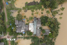 Cảnh ngập lụt sau những trận mưa lớn tại Kelaniya, Sri Lanka. (Ảnh: THX/TTXVN)