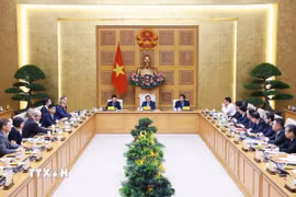 Thủ tướng Phạm Minh Chính gặp mặt đại diện các doanh nghiệp Hoa Kỳ đang đầu tư, kinh doanh tại Việt Nam. (Ảnh: Dương Giang/TTXVN)