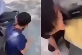 Clip lan truyền trên mạng xã hội ghi lại cảnh một nam sinh bị nhóm học sinh quây lại, liên tục quát mắng, bắt quỳ.