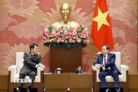 Chủ tịch Quốc hội Trần Thanh Mẫn với Đại tướng Lương Tam Quang, Bộ trưởng Bộ Công an. (Ảnh: Doãn Tấn/TTXVN)