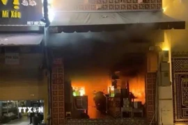 Hiện trường vụ hỏa hoạn làm 4 người tử vong. (Ảnh: TTXVN phát)