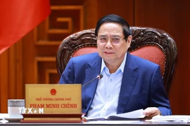 Thủ tướng Phạm Minh Chính chủ trì họp Thường trực Chính phủ về phát triển Đề án Khu thương mại tự do và Trung tâm lọc hóa dầu và năng lượng quốc gia tại Dung Quất. (Ảnh: Dương Giang/TTXVN)