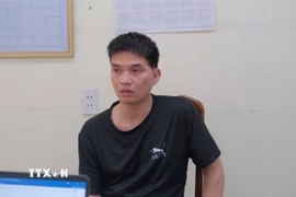 Đối tượng Hoàng Văn Duy tại cơ quan Công an. (Ảnh: TTXVN phát)
