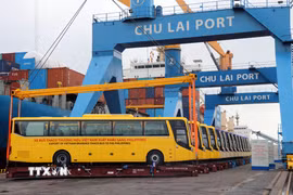 Lễ bàn giao 15 xe buýt THACO thương hiệu Việt Nam xuất khẩu sang Philippines, tháng 12/2019. (Ảnh: Trần Tĩnh/TTXVN)