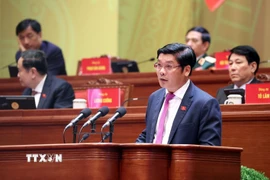 Đồng chí Nguyễn Chí Tài, Phó Bí thư Thành ủy, Chủ tịch Ủy ban Mặt trận Tổ quốc Việt Nam thành phố Huế, trình bày tham luận “Phát huy thế mạnh di sản, xây dựng Huế thành đô thị di sản, trung tâm văn hóa, du lịch đặc sắc tầm cỡ quốc tế.” (Ảnh: TTXVN)