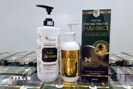 Sản phẩm mỹ phẩm giả do cơ sở của Vũ Thị Thu Hà sản xuất. (Ảnh: TTXVN phát)