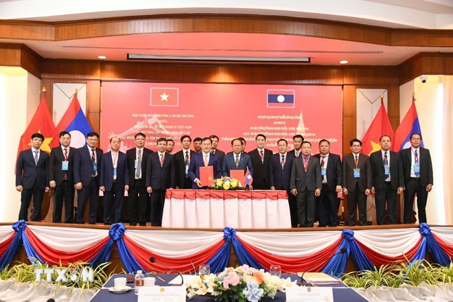 O Ministério da Segurança Pública do Vietnã e o Ministério da Segurança Pública do Laos reforçam a cooperação. (Fonte: VNA) ttxvn-viet-lao.jpg