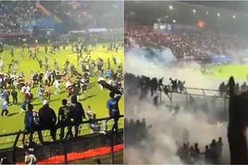 Cảnh hỗn loạn khi các cổ động viên tràn xuống sân Kanjuruhan trong trận đấu giữa Arema FC và Persebaya Surabaya ở tỉnh Đông Java, Indonesia tối 1/10/2022. Ảnh: ESPECIAL/TTXVN