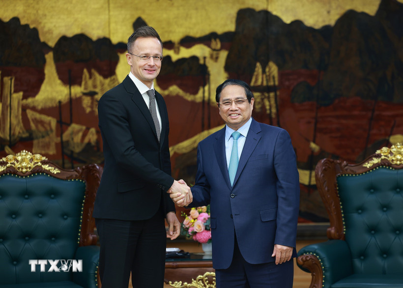 Ngày 19/3/2025, tại Hà Nội, Thủ tướng Phạm Minh Chính tiếp Bộ trưởng Ngoại giao và Kinh tế đối ngoại Hungary Szijjarto Peter đang thăm chính thức Việt Nam. (Ảnh: Dương Giang/TTXVN)