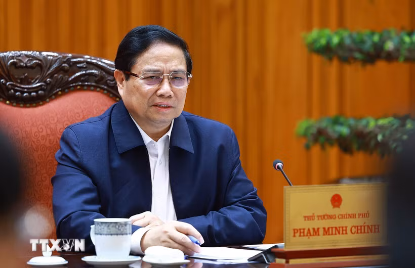 Thủ tướng Phạm Minh Chính chủ trì cuộc họp với các bộ, ngành để tháo gỡ khó khăn, vướng mắc các dự án tồn đọng. (Ảnh: Dương Giang/TTXVN)
