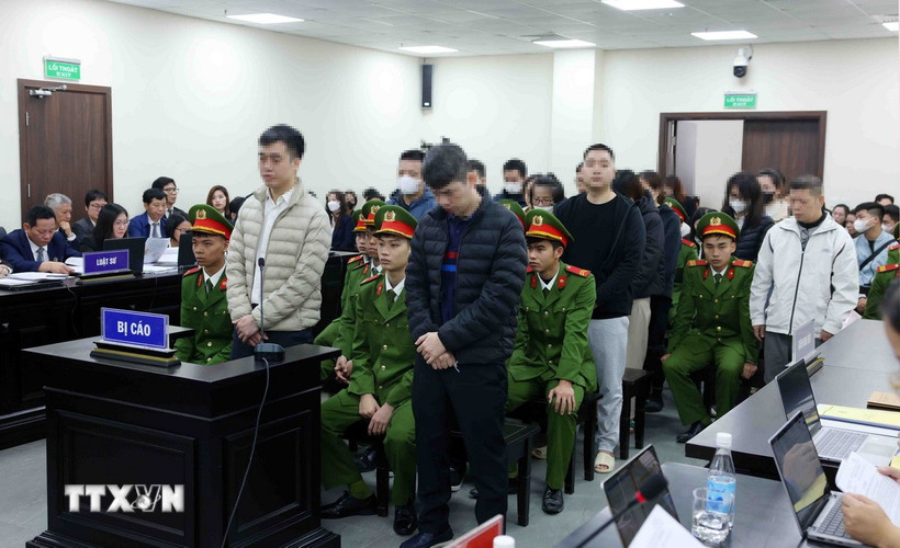 Các bị cáo tại phiên tòa xét xử. (Ảnh: Phạm Kiên/TTXVN)