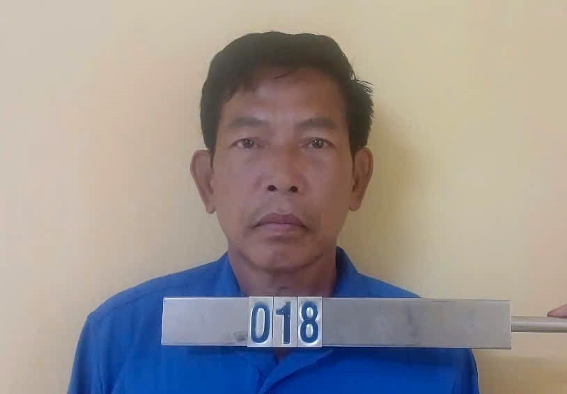 Đối tượng Vũ Văn Huân tại cơ quan công an. (Ảnh: TTXVN phát)