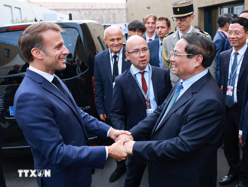 Thủ tướng Phạm Minh Chính hội kiến Tổng thống Pháp Emmanuel Macron. (Ảnh: Dương Giang/TTXVN)