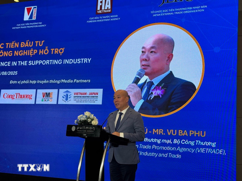 Ông Vũ Bá Phú, Cục trưởng Cục Xúc tiến thương mại (Bộ Công Thương), phát biểu tại Hội thảo. (Ảnh: Uyên Hương/TTXVN)