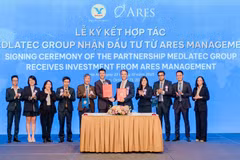 Lễ ký kết hợp tác giữa hai bên. (Ảnh: PV/Vietnam+)