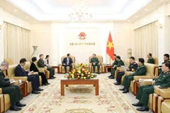 Thượng tướng Hoàng Xuân Chiến đã tiếp Đại sứ Trung Quốc tại Việt Nam Hà Vĩ. (Ảnh: PV/Vietnam+)