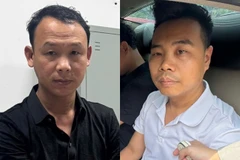 2 đối tượng hành hung nam sinh trên phố Nguyễn Khang. (Ảnh: CACC)