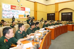 Các đại biểu dự hội nghị tại điểm cầu Bộ Quốc phòng. (Ảnh: PV/Vietnam+)