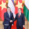 Chủ tịch Quốc hội Trần Thanh Mẫn đón Chủ tịch Hạ viện Uzbekistan Nuriddin Ismoilov. (Ảnh: Doãn Tấn/TTXVN)
