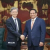 Chiều 18/9/2025, tại Hà Nội, Thủ tướng Phạm Minh Chính tiếp ông Kenji Okamura, Phó Tổng Giám đốc Quỹ Tiền tệ Quốc tế (IMF) đang thăm và làm việc tại Việt Nam. (Ảnh: Dương Giang/TTXVN)