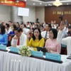 Đại biểu Hội đồng Nhân dân tỉnh Đồng Nai khóa X biểu quyết thông qua nhiều nghị quyết quan trọng tại kỳ họp thứ 10. (Ảnh: Sỹ Tuyên/TTXVN)