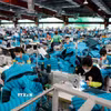 May hàng xuất khẩu sang thị trường Mỹ, EU tại Công ty may Maxport. (Ảnh: Trần Việt/TTXVN)