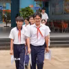 Thí sinh tại điểm thi Trường Trung học cơ sở Dương Bá Trạc (phường Chánh Hưng) hoàn thành bài thi môn Ngữ văn. (Ảnh: Trung Tuyến/TTXVN)