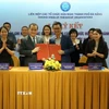Quang cảnh lễ ký kết. (Ảnh: Quốc Dũng/TTXVN)