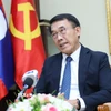 Trưởng ban Đối ngoại Trung ương Lào Bounleua Phandanouvong trả lời phỏng vấn. (Ảnh: Đỗ Bá Thành/TTXVN)