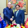 Thủ tướng Phạm Minh Chính và Thủ tướng New Zealand Christopher Luxon. (Ảnh: Dương Giang/TTXVN )