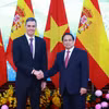 Thủ tướng Phạm Minh Chính và Thủ tướng Tây Ban Nha Pedro Sánchez chụp ảnh chung trước khi tiến hành hội đàm. (Ảnh: Dương Giang/TTXVN)