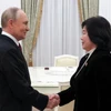 Tổng thống Nga Vladimir Putin và Bộ trưởng Ngoại giao Triều Tiên Choe Son Hui (Nguồn: Sputnik/Reuters)