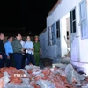 Thủ tướng Phạm Minh Chính thăm, chỉ đạo công tác khắc phục hậu quả của bão số 10 tại xã Quỹ Nhất. (Ảnh: Dương Giang/TTXVN)