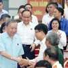 Tổng Bí thư Tô Lâm cùng các thành viên Đoàn đại biểu Quốc hội thành phố Hà Nội, đơn vị bầu cử số 10 tiếp xúc cử tri 9 xã. (Ảnh: Thống Nhất/TTXVN)