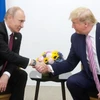 Tổng thống Nga Vladimir Putin (trái) và Tổng thống Mỹ Donald Trump tại cuộc gặp bên lề hội nghị thượng đỉnh G20 ở Osaka, Nhật Bản, ngày 28/6/2019. (Nguồn: Getty Images/TTXVN)