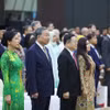 Tổng Bí thư Tô Lâm và Phu nhân cùng Tổng Thư ký ASEAN Kao Kim Hourn và Phu nhân thực hiện nghi thức chào cờ ASEAN. Ảnh: Thống Nhất – TTXVN