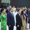 Tổng Bí thư Tô Lâm và Phu nhân cùng Tổng Thư ký ASEAN Kao Kim Hourn và Phu nhân thực hiện nghi thức chào cờ ASEAN. Ảnh: Thống Nhất – TTXVN
