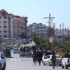 Lực lượng an ninh Syria tiến vào thành phố Sweida ở miền nam nước này. (Ảnh: THX/TTXVN)