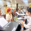 Thành phố Hồ Chí Minh khám tầm soát sức khỏe sinh sản miễn phí cho 35.000 nữ công nhân. (Ảnh: Thanh Vũ/TTXVN)